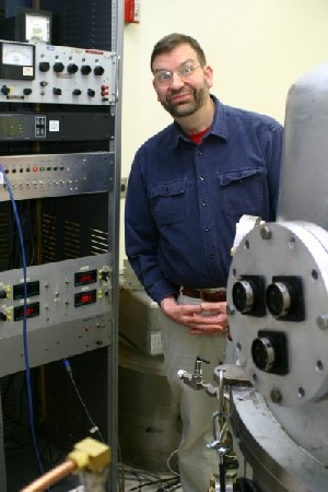 Professor Gay and lab equipment