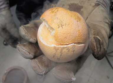 Orange frozen in liquid nitrogen