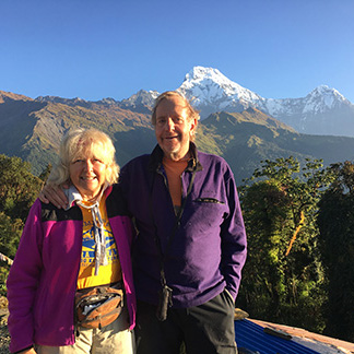 Sylvia and Roger Wiegand in Tadapani, view of Annapurna South, in Nepal
