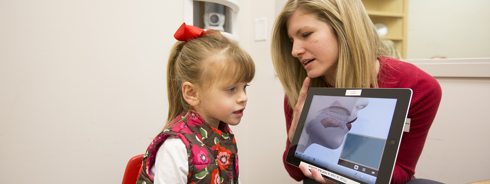 clinician working with child