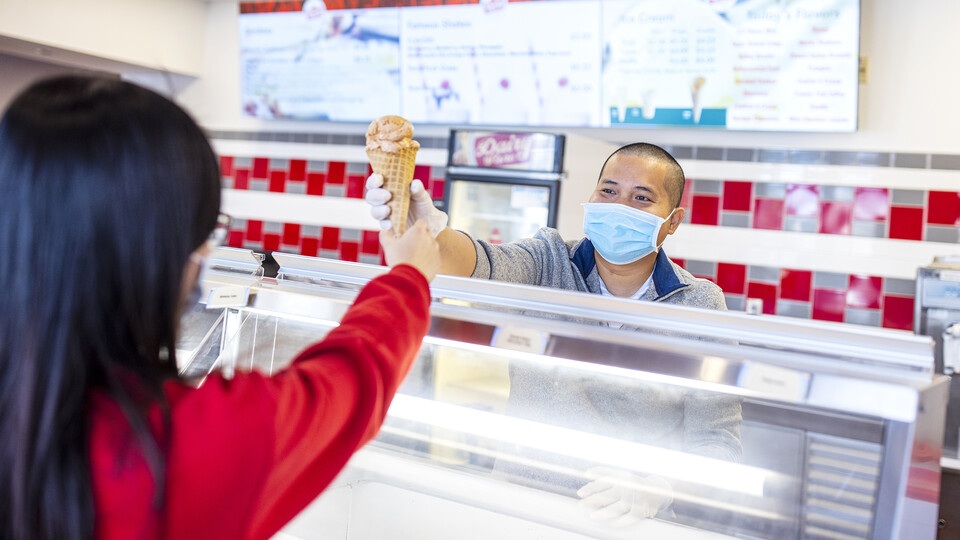 Student buying an ice cream store.