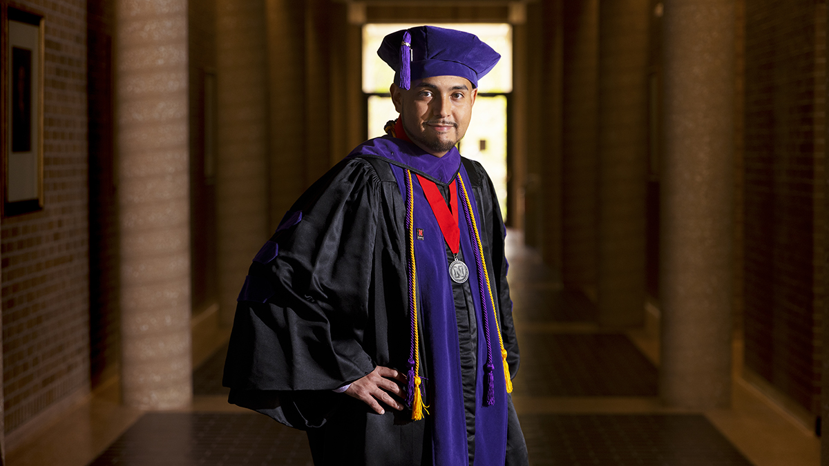 Mauricio Murga Rios in graduation robe