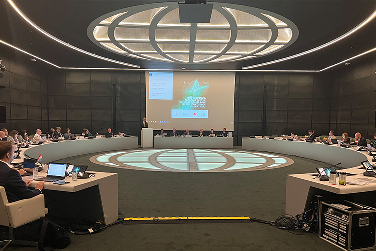 Professor Jack Beard at The Hague with a large group of representatives